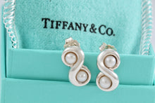 Load image into Gallery viewer, Tiffany &amp; Co. Infinity Silver Pearl Stud Earrings
