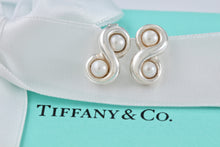 Load image into Gallery viewer, Tiffany &amp; Co. Infinity Silver Pearl Stud Earrings
