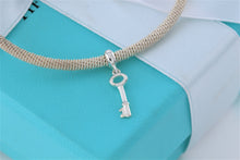 Load image into Gallery viewer, Tiffany &amp; Co. Dangling Key Charm Mesh Cuff Bracelet
