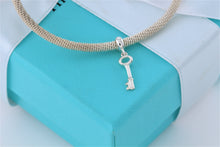 Load image into Gallery viewer, Tiffany &amp; Co. Dangling Key Charm Mesh Cuff Bracelet
