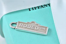 Load image into Gallery viewer, Tiffany &amp; Co. Silver &quot;RODEO DR.&quot; Streen Sign Charm Pendant
