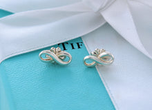 Load image into Gallery viewer, Tiffany &amp; Co. Infinity Silver Stud Earrings
