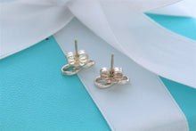 Load image into Gallery viewer, Tiffany &amp; Co. Infinity Silver Stud Earrings
