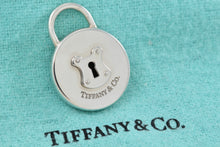 Load image into Gallery viewer, Tiffany &amp; Co. Silver Locks Keyhole Circle Padlock Pendant
