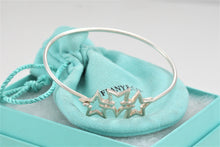 Load image into Gallery viewer, Tiffany &amp; Co. Silver Triple Star Hook Bangle Bracelet
