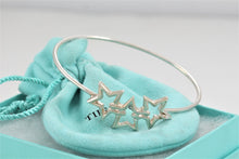 Load image into Gallery viewer, Tiffany &amp; Co. Silver Triple Star Hook Bangle Bracelet
