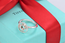 Load image into Gallery viewer, Tiffany &amp; Co. Atlas Silver Roman Numeral Medallion Ring Size 5.5
