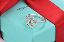 Load image into Gallery viewer, Tiffany &amp; Co. Atlas Silver Roman Numeral Medallion Ring Size 5.5
