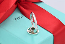 Load image into Gallery viewer, Tiffany &amp; Co. Atlas Silver Roman Numeral Medallion Ring Size 5.5
