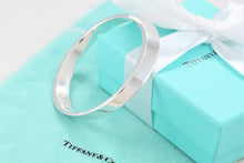 Load image into Gallery viewer, Tiffany &amp; Co. Silver Geometric Oval Bangle Bracelet
