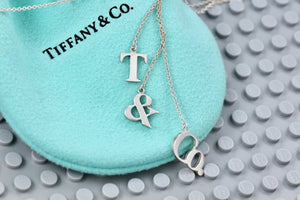 Tiffany & Co. Silver Dangling ''T & Co.'' Dangle Charm Pendant Necklace