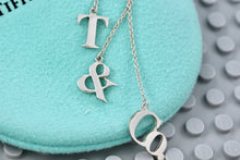 Load image into Gallery viewer, Tiffany &amp; Co. Silver Dangling &#39;&#39;T &amp; Co.&#39;&#39; Dangle Charm Pendant Necklace
