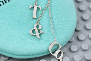 Tiffany & Co. Silver Dangling ''T & Co.'' Dangle Charm Pendant Necklace