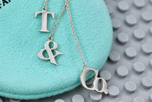 Load image into Gallery viewer, Tiffany &amp; Co. Silver Dangling &#39;&#39;T &amp; Co.&#39;&#39; Dangle Charm Pendant Necklace
