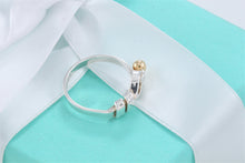 Load image into Gallery viewer, Tiffany &amp; Co. 18K Gold &amp; Silver Hook &amp; Eye Ring Vintage Version 1
