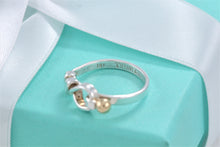 Load image into Gallery viewer, Tiffany &amp; Co. 18K Gold &amp; Silver Hook &amp; Eye Ring Vintage Version 1
