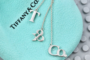 Tiffany & Co. Silver Dangling ''T & Co.'' Dangle Charm Pendant Necklace