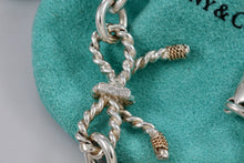 Load image into Gallery viewer, Tiffany &amp; Co. 14K Gold &amp; Silver Twist Ribbon Bow Bracelet Customized
