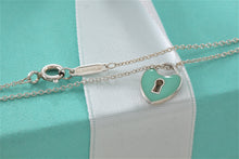 Load image into Gallery viewer, Tiffany &amp; Co. Silver Blue Enamel Mini Keyhole Heart Pendant Necklace

