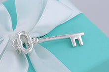 Load image into Gallery viewer, Tiffany &amp; Co. Silver Skeleton Oval Key 2&quot; Pendant
