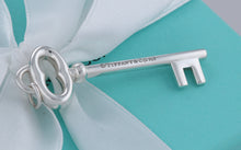 Load image into Gallery viewer, Tiffany &amp; Co. Silver Skeleton Oval Key 2&quot; Pendant
