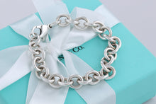 Load image into Gallery viewer, Tiffany &amp; Co. Silver 10mm Link 7.5&quot; Charm Clasp Bracelet
