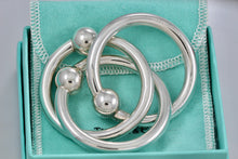 Load image into Gallery viewer, Tiffany &amp; Co. Silver Triple Interlocking Rings Baby Rattle
