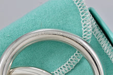 Load image into Gallery viewer, Tiffany &amp; Co. Silver Triple Interlocking Rings Baby Rattle
