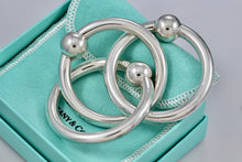 Load image into Gallery viewer, Tiffany &amp; Co. Silver Triple Interlocking Rings Baby Rattle
