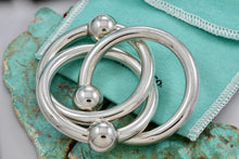 Load image into Gallery viewer, Tiffany &amp; Co. Silver Triple Interlocking Rings Baby Rattle
