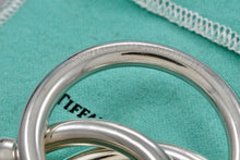 Load image into Gallery viewer, Tiffany &amp; Co. Silver Triple Interlocking Rings Baby Rattle
