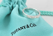 Load image into Gallery viewer, Tiffany &amp; Co. Silver Notes &quot;Fifth Ave&quot; Narrow Band Ring
