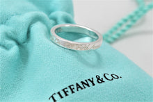 Load image into Gallery viewer, Tiffany &amp; Co. Silver Notes &quot;Fifth Ave&quot; Narrow Band Ring
