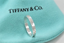 Load image into Gallery viewer, Tiffany &amp; Co. Silver Notes &quot;Fifth Ave&quot; Narrow Band Ring
