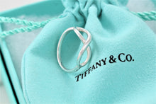 Load image into Gallery viewer, Tiffany &amp; Co. Infinity Silver Classic Band Ring
