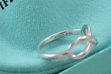 Load image into Gallery viewer, Tiffany &amp; Co. Infinity Silver Classic Band Ring
