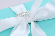 Load image into Gallery viewer, Tiffany &amp; Co. Silver Ribbon Bow Ring
