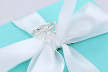Load image into Gallery viewer, Tiffany &amp; Co. Silver Ribbon Bow Ring

