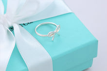 Load image into Gallery viewer, Tiffany &amp; Co. Silver Ribbon Bow Ring
