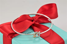 Load image into Gallery viewer, Tiffany &amp; Co. 18K Gold &amp; Silver Love Knot Hook Bangle Bracelet
