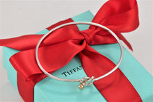 Load image into Gallery viewer, Tiffany &amp; Co. 18K Gold &amp; Silver Love Knot Hook Bangle Bracelet
