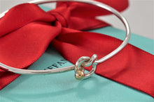 Load image into Gallery viewer, Tiffany &amp; Co. 18K Gold &amp; Silver Love Knot Hook Bangle Bracelet
