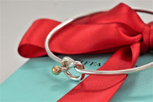 Load image into Gallery viewer, Tiffany &amp; Co. 18K Gold &amp; Silver Love Knot Hook Bangle Bracelet
