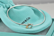 Load image into Gallery viewer, Tiffany &amp; Co. 18K Gold &amp; Silver Love Knot Hook Bangle Bracelet
