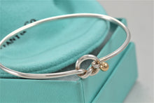 Load image into Gallery viewer, Tiffany &amp; Co. 18K Gold &amp; Silver Love Knot Hook Bangle Bracelet
