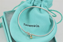 Load image into Gallery viewer, Tiffany &amp; Co. 18K Gold &amp; Silver Love Knot Hook Bangle Bracelet
