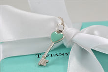 Load image into Gallery viewer, Tiffany &amp; Co. Silver Blue Enamel Small Heart Key Charm Pendant Necklace
