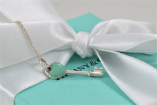 Load image into Gallery viewer, Tiffany &amp; Co. Silver Blue Enamel Small Heart Key Charm Pendant Necklace
