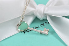 Load image into Gallery viewer, Tiffany &amp; Co. Silver Blue Enamel Small Heart Key Charm Pendant Necklace
