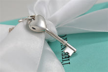 Load image into Gallery viewer, Tiffany &amp; Co. Silver Blue Enamel Small Heart Key Charm Pendant Necklace
